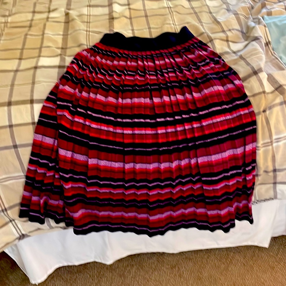 Kate spade multi color skirt. Calf length. Never worn.